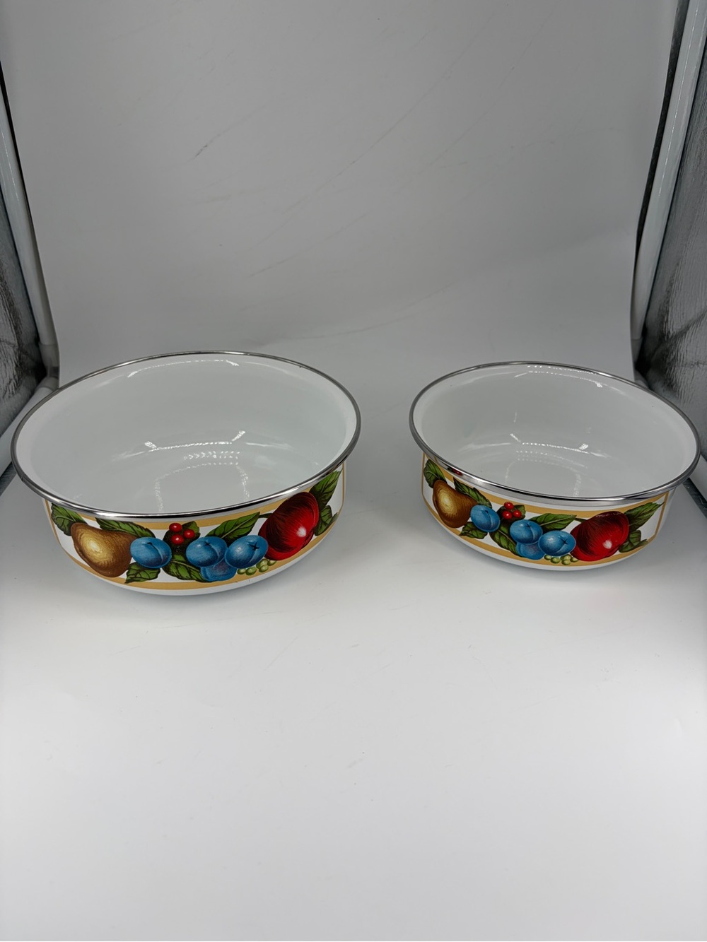 Tabletops Unlimited set of 2 EDEN enamel metal bowls.